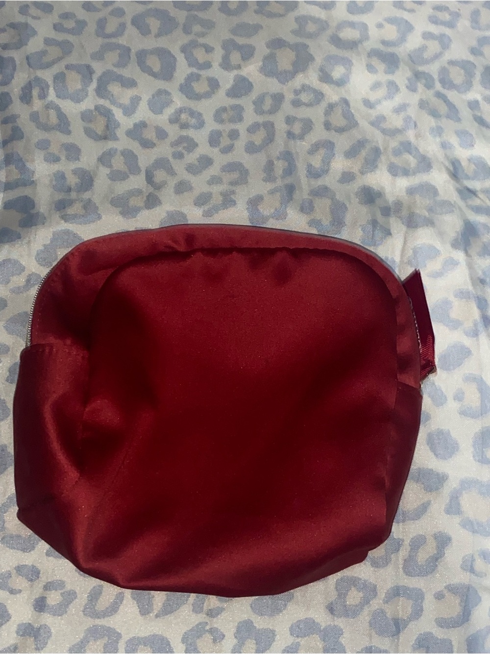 Red satin cosmetic pouch